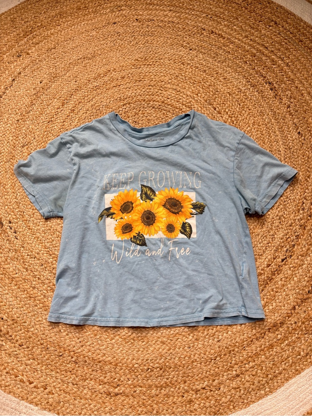 Rebellious One Blue Tee with Sunflower Graphic